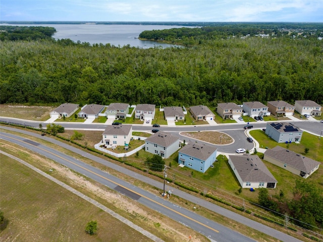 3033 Beau Loop, Tavares, FL 32778 - birds eye view of property with a water view, a residential view, and a wooded view