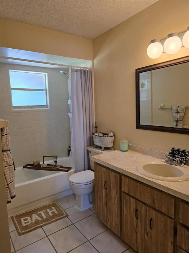 full bath with vanity, tile patterned flooring, toilet, a textured ceiling, and shower / bath combo