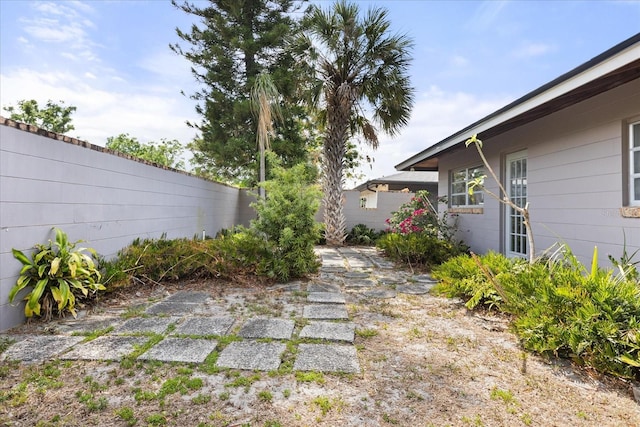 view of yard with fence
