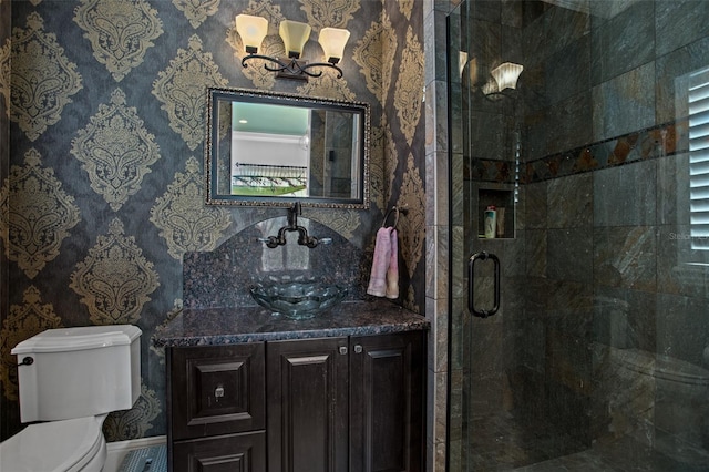 9730 Lounsberry Cir, Golden Oak, FL 32836 - full bath featuring toilet, a stall shower, vanity, and wallpapered walls