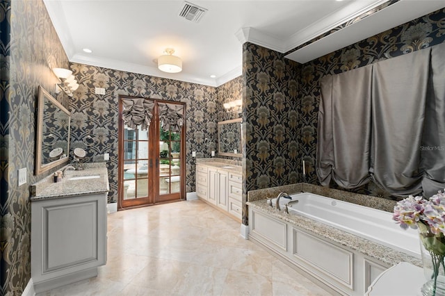 9730 Lounsberry Cir, Golden Oak, FL 32836 - bathroom with french doors, crown molding, two vanities, wallpapered walls, and a garden tub