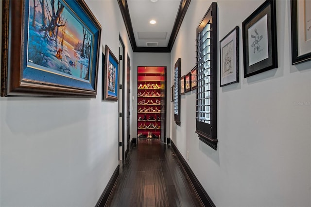 9730 Lounsberry Cir, Golden Oak, FL 32836 - corridor featuring dark wood-style floors, ornamental molding, baseboards, and recessed lighting