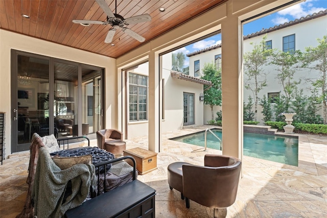 9730 Lounsberry Cir, Golden Oak, FL 32836 - outdoor pool with ceiling fan, a patio, and an outdoor living space