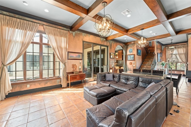 9730 Lounsberry Cir, Golden Oak, FL 32836 - tiled living area with a chandelier, stairs, coffered ceiling, plenty of natural light, and beam ceiling