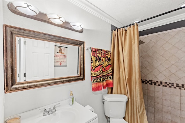 bathroom with crown molding, vanity, toilet, and curtained shower