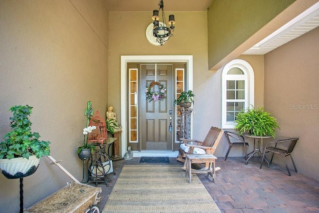 18108 Bellezza Dr, Orlando, FL 32820 - view of exterior entry featuring stucco siding
