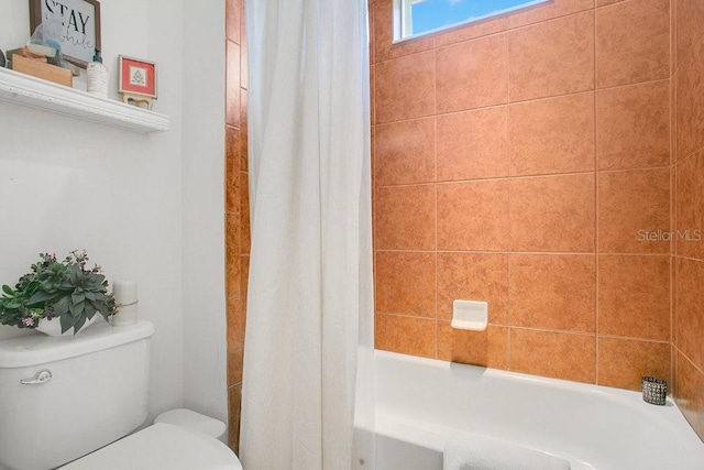 18108 Bellezza Dr, Orlando, FL 32820 - bathroom featuring shower / bath combination with curtain and toilet
