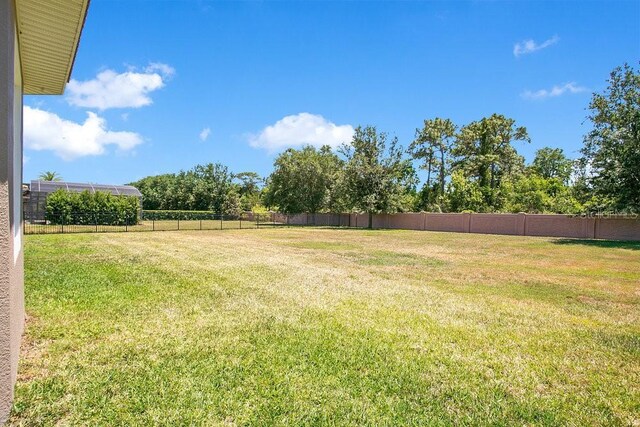 18108 Bellezza Dr, Orlando, FL 32820 - view of yard with fence