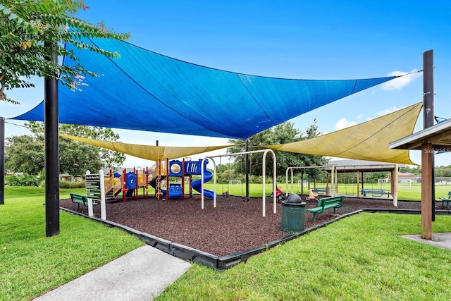 community play area with a lawn