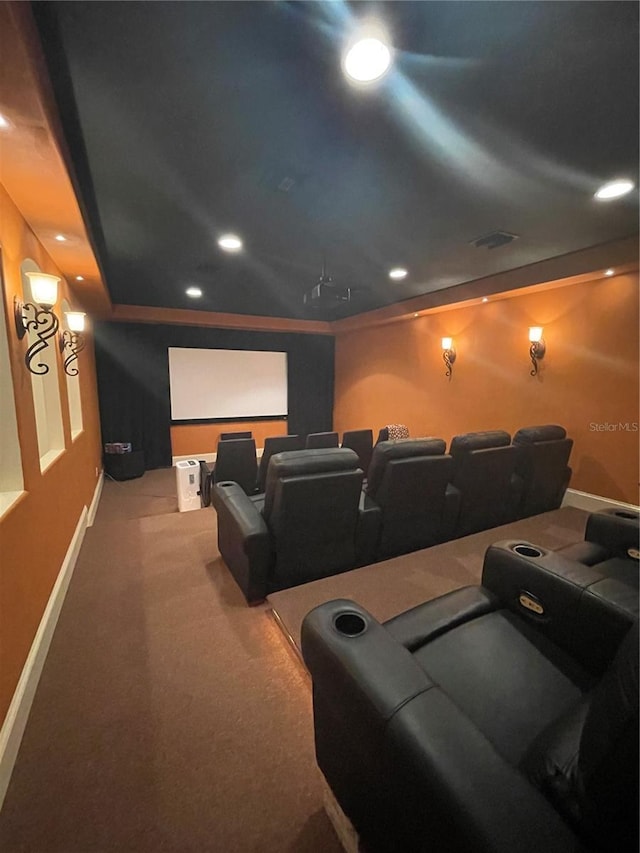 carpeted cinema with recessed lighting, baseboards, and visible vents