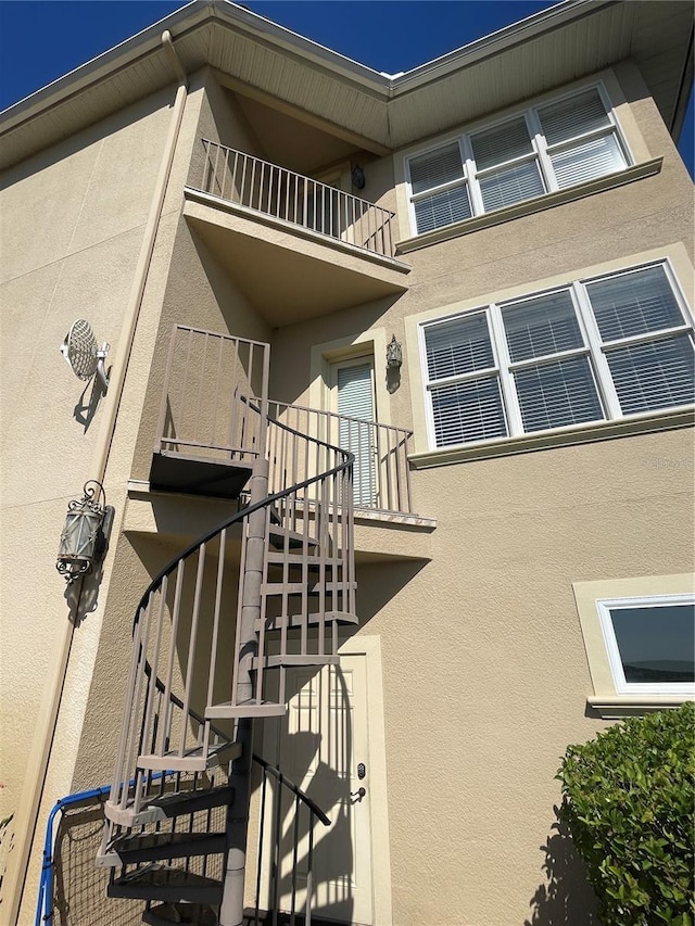 view of building exterior featuring stairway