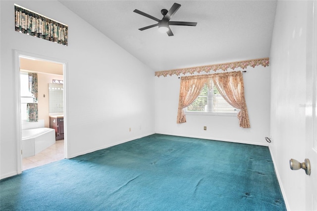 3137 Timucua Cir, Orlando, FL 32837 - unfurnished room with vaulted ceiling, carpet, and a ceiling fan