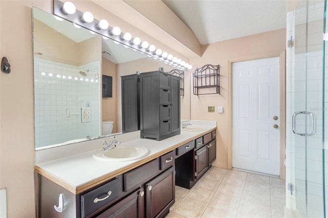 3137 Timucua Cir, Orlando, FL 32837 - full bath with double vanity, a shower stall, and tile patterned flooring