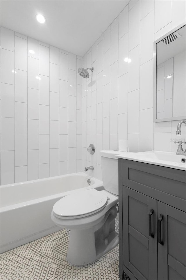 full bath featuring toilet,  shower combination, and vanity