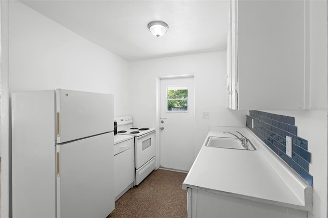 kitchen featuring a sink, white appliances, white cabinetry, and light countertops