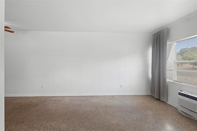 empty room with a ceiling fan