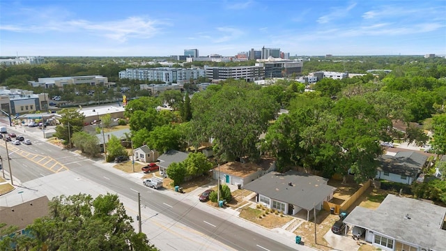 birds eye view of property with a view of city