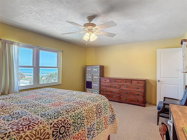 bedroom with carpet floors and ceiling fan