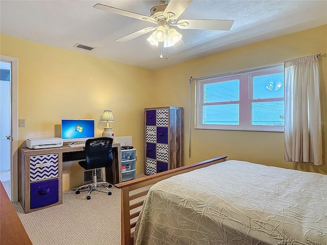 bedroom featuring carpet flooring, a ceiling fan, and visible vents