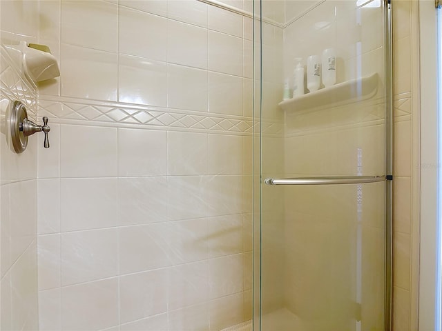 full bath featuring a stall shower