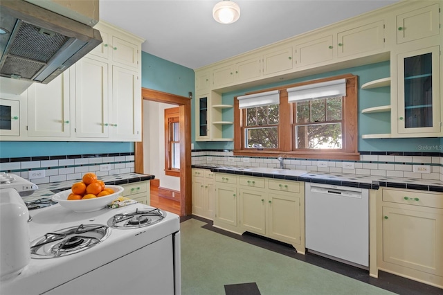 806 E Amelia St, Orlando, FL 32803 - kitchen with open shelves, tile counters, range hood, white appliances, and tasteful backsplash