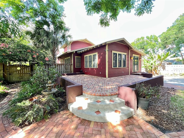 806 E Amelia St, Orlando, FL 32803 - view of front of home featuring a patio area and fence