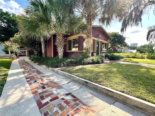 806 E Amelia St, Orlando, FL 32803 - mediterranean / spanish-style house with a front lawn