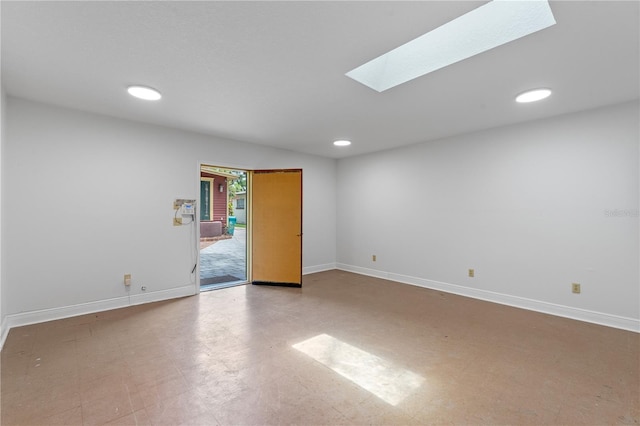 806 E Amelia St, Orlando, FL 32803 - unfurnished room with tile patterned floors, baseboards, a skylight, and recessed lighting