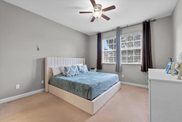 9009 Savannah Julip Ln, Orlando, FL 32832 - bedroom with light carpet, baseboards, and ceiling fan