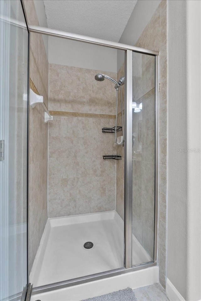 9009 Savannah Julip Ln, Orlando, FL 32832 - bathroom with a stall shower