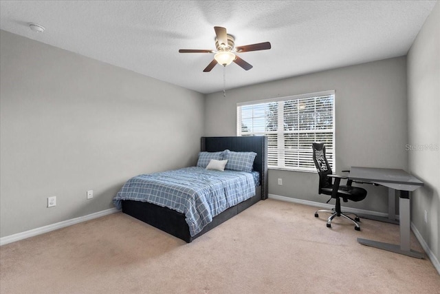 9009 Savannah Julip Ln, Orlando, FL 32832 - bedroom with carpet, baseboards, a ceiling fan, and a textured ceiling