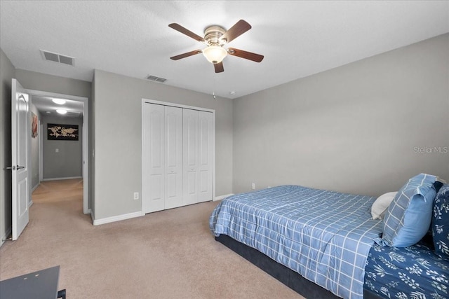 9009 Savannah Julip Ln, Orlando, FL 32832 - carpeted bedroom with a closet, baseboards, and ceiling fan