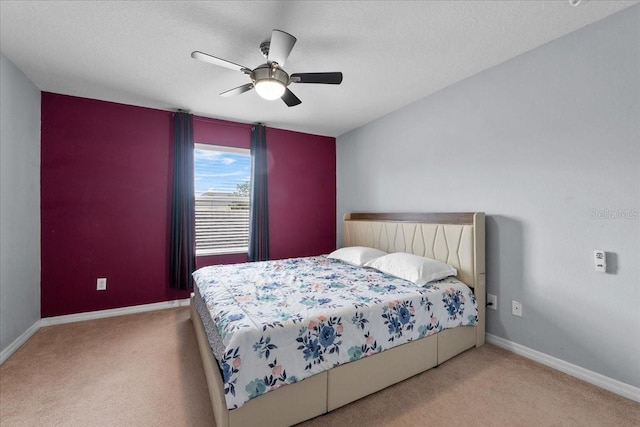 9009 Savannah Julip Ln, Orlando, FL 32832 - bedroom with carpet floors, baseboards, and ceiling fan