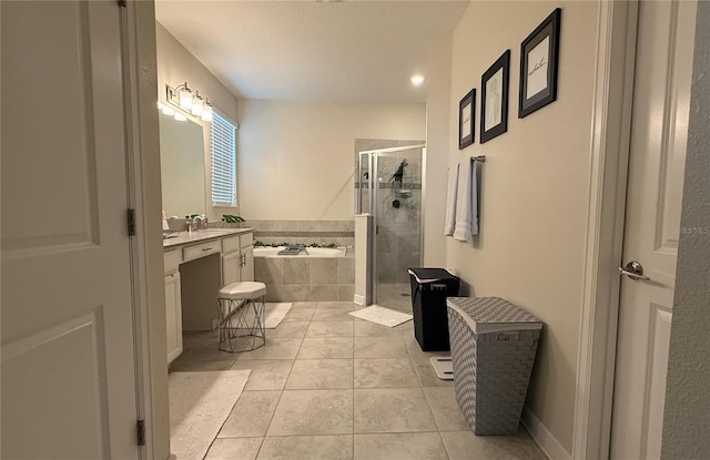 full bathroom featuring vanity, tile patterned flooring, a stall shower, and a bath