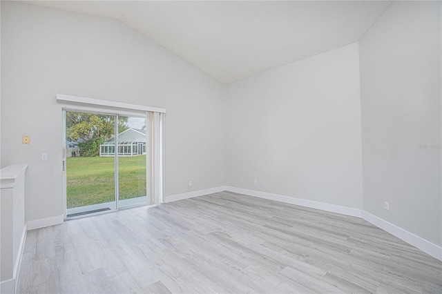 13434 Mallard Cove Blvd, Orlando, FL 32837 - unfurnished room with light wood-style flooring, baseboards, and high vaulted ceiling