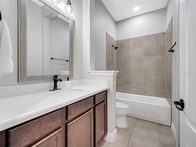 full bathroom featuring vanity, tile patterned floors, toilet, and tub / shower combination