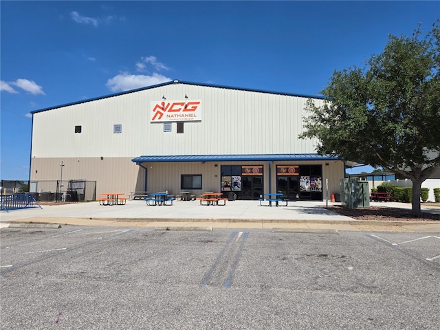 119 Stewart Lake Loop, Groveland, FL 34736 - view of building exterior featuring uncovered parking