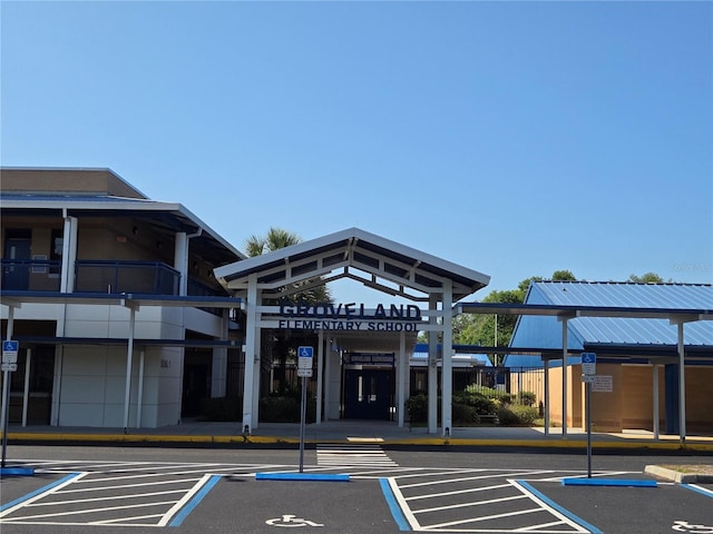 119 Stewart Lake Loop, Groveland, FL 34736 - view of building exterior with uncovered parking