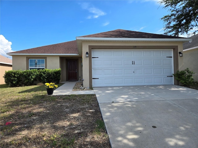 119 Stewart Lake Loop, Groveland, FL 34736 - ranch-style house featuring stucco siding, a shingled roof, concrete driveway, and a garage