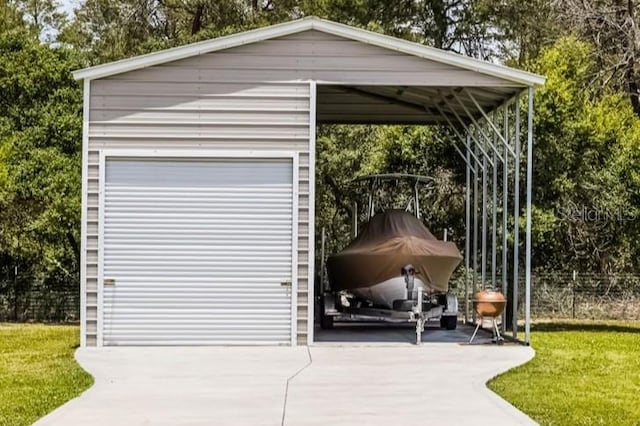 garage with concrete driveway