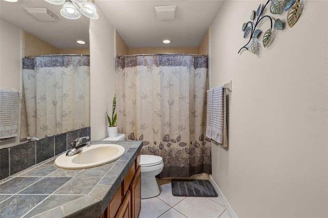 bathroom featuring visible vents, tile patterned flooring, vanity, toilet, and recessed lighting