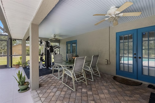 view of patio with ceiling fan, french doors, and outdoor dining space