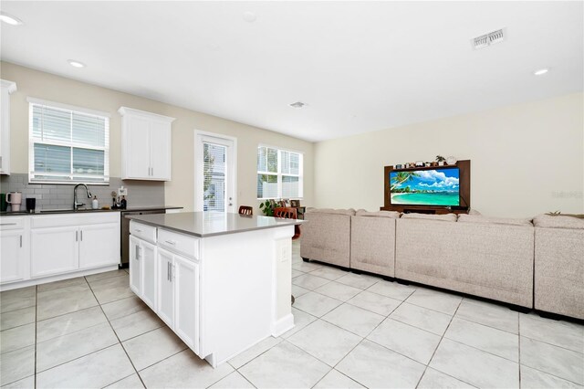 2919 Verse St, Kissimmee, FL 34746 - kitchen featuring a sink, light tile patterned floors, open floor plan, and visible vents