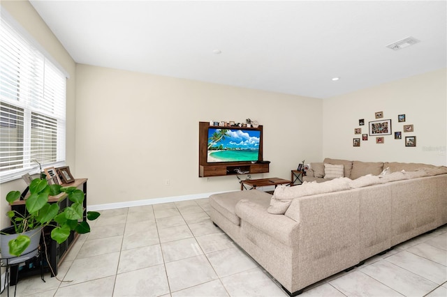 2919 Verse St, Kissimmee, FL 34746 - living area with visible vents, baseboards, and light tile patterned floors