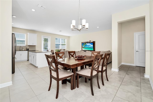 2919 Verse St, Kissimmee, FL 34746 - dining room featuring baseboards, visible vents, recessed lighting, and a notable chandelier