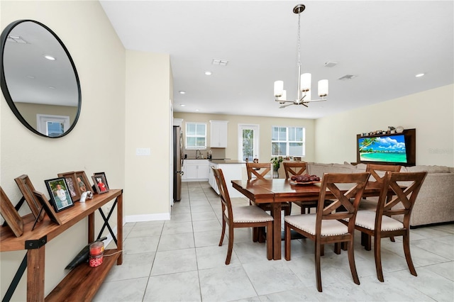2919 Verse St, Kissimmee, FL 34746 - dining room with recessed lighting, a notable chandelier, light tile patterned floors, and visible vents