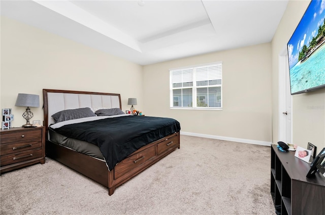 2919 Verse St, Kissimmee, FL 34746 - bedroom featuring a tray ceiling, light colored carpet, multiple windows, and baseboards
