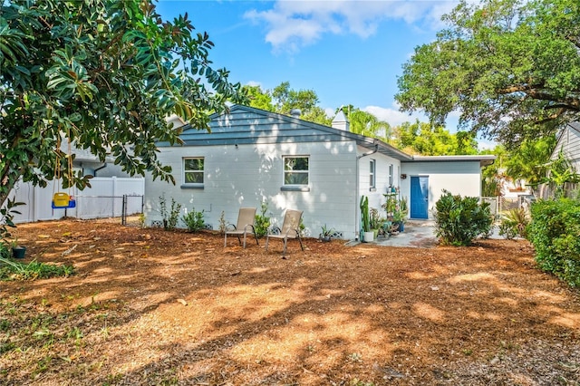 view of property exterior with fence
