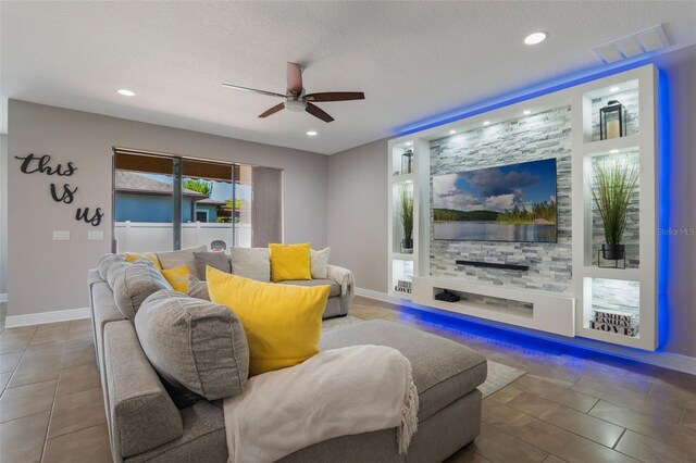 15443 Sugarcup Ct, Orlando, FL 32828 - tiled living room featuring ceiling fan, baseboards, recessed lighting, and a textured ceiling