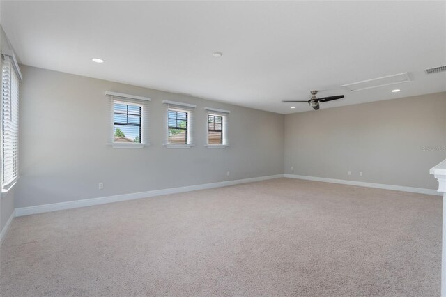 15443 Sugarcup Ct, Orlando, FL 32828 - spare room featuring baseboards, recessed lighting, light carpet, and a ceiling fan